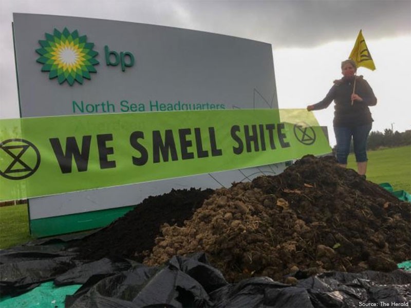 Extinction Rebellion Scotland dumps mounds of manure outside BP Aberdeen offices