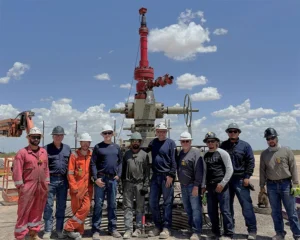 The wellsite team celebrate first FliCS deployment.