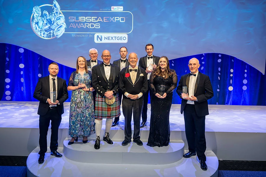 Some-of-the-Subsea-Expo-Awards-2025-winner-pictured-with-in-centre-Neil-Gordon-of-GUH-and-guest-speaker-Gyles-Brandreth